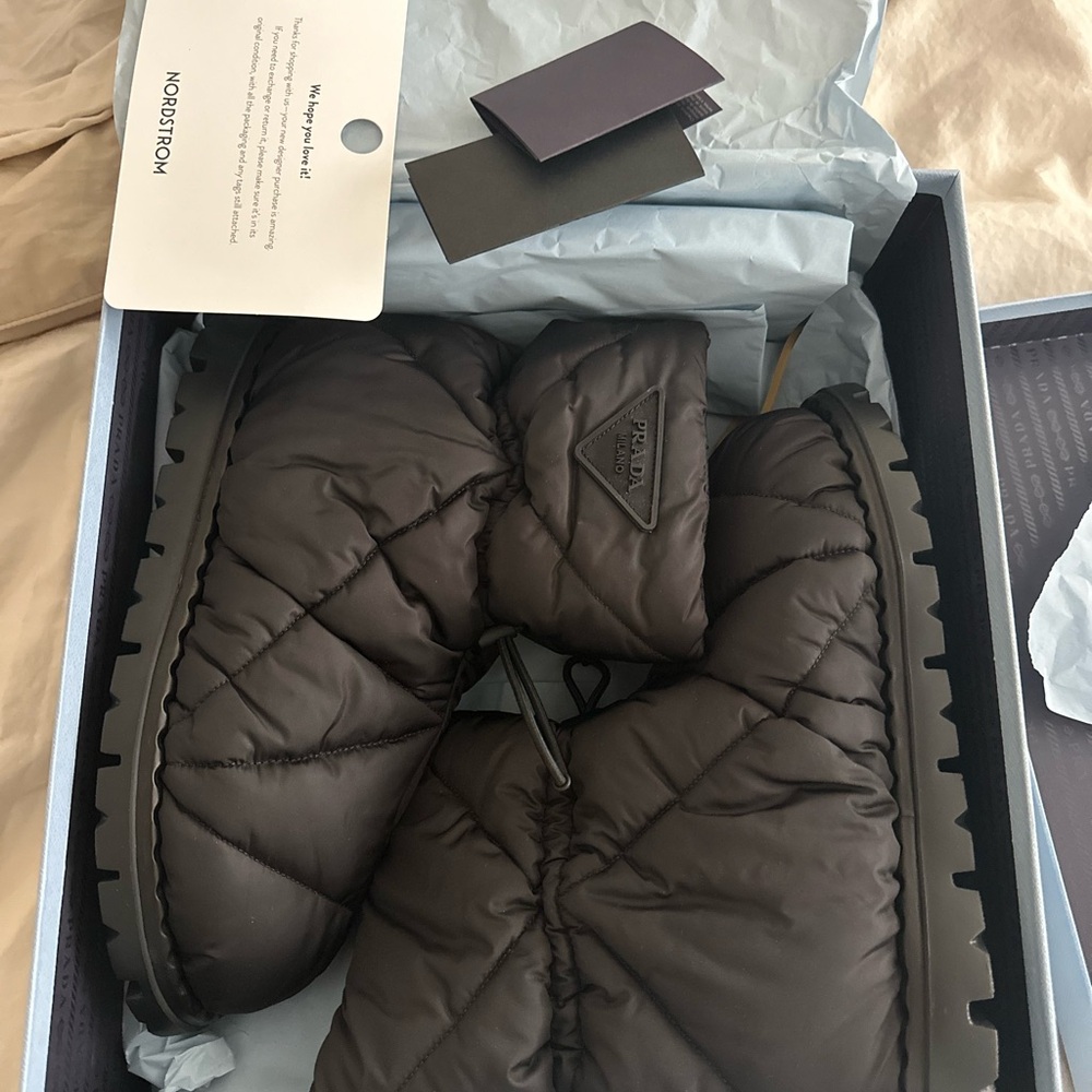 Prada Dark Quilted Boots